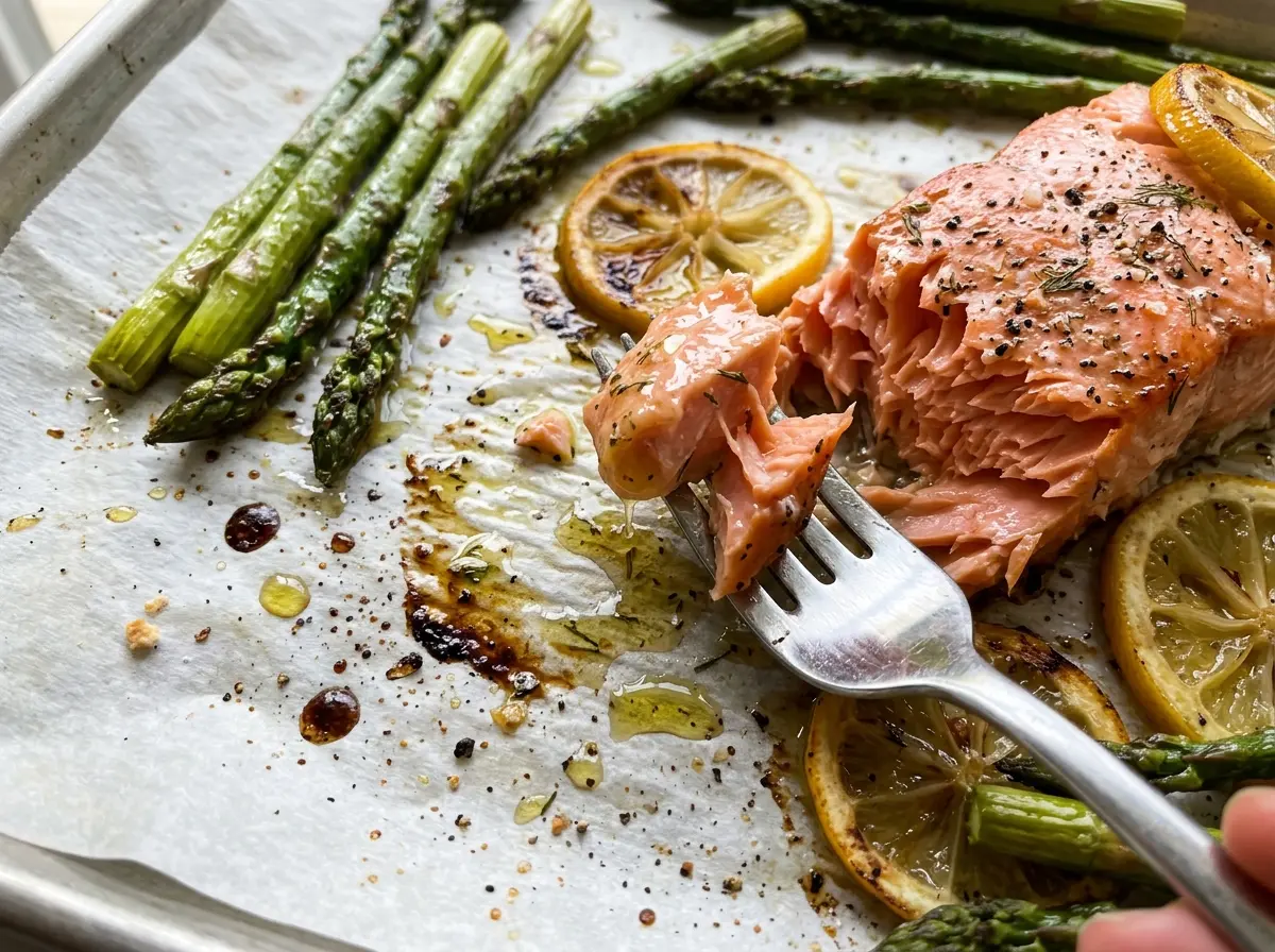 Sheet Pan Salmon and Asparagus with lemon-topped fillets